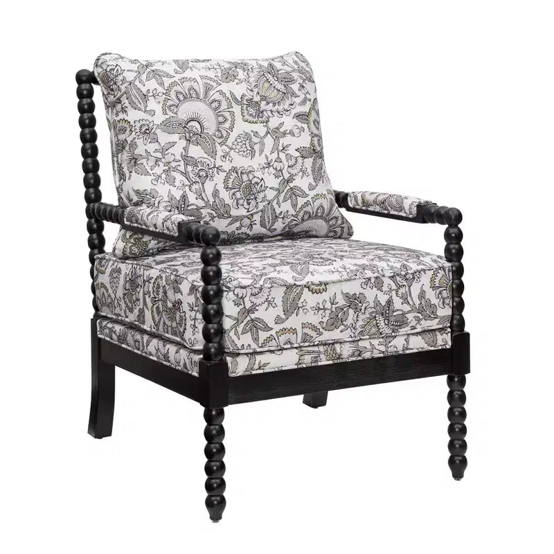 Sillón auxiliar tapizado Spool con estructura de madera torneada